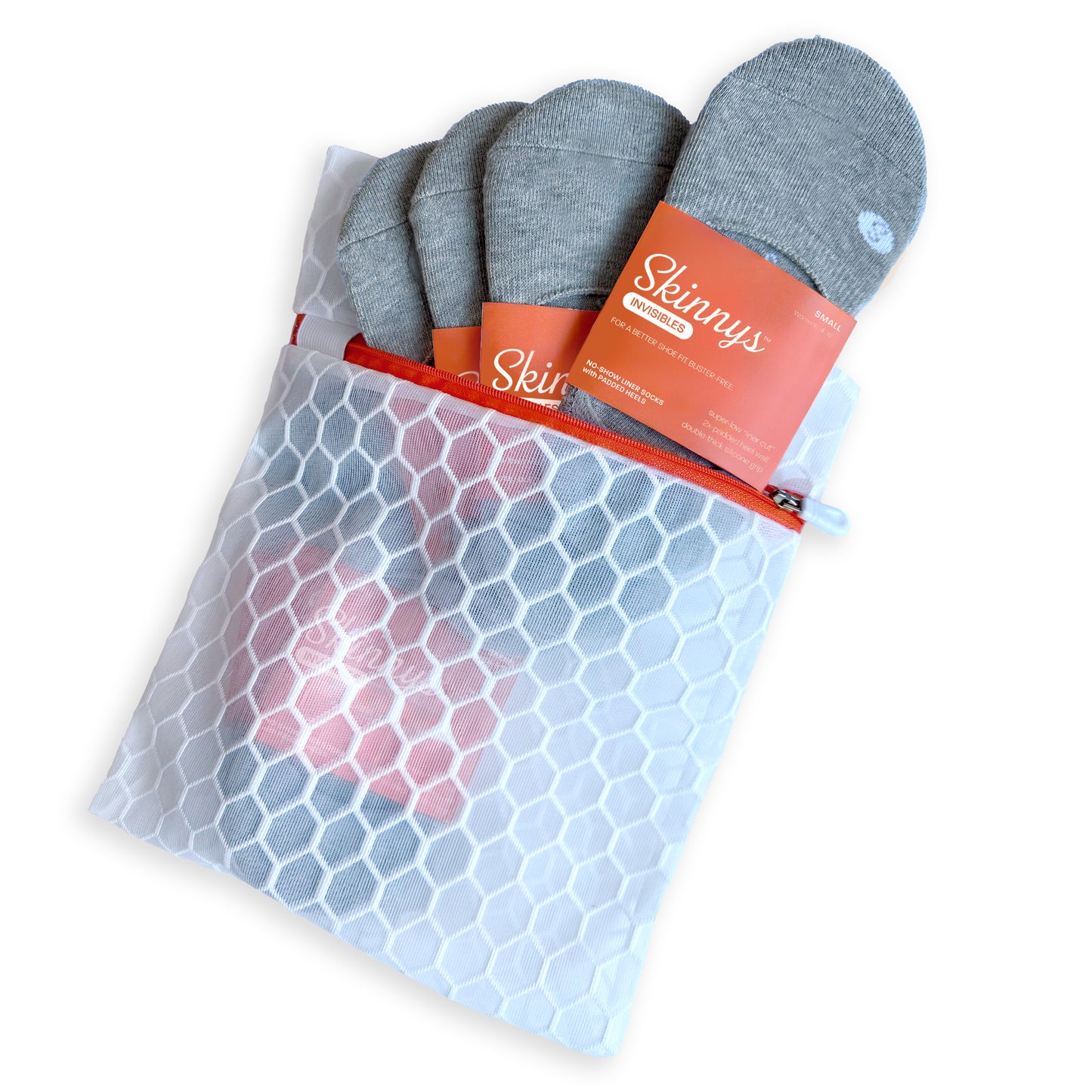 Photo of a Skinnys Invisibles Daily Pack, with 7 pairs and a mesh wash bag