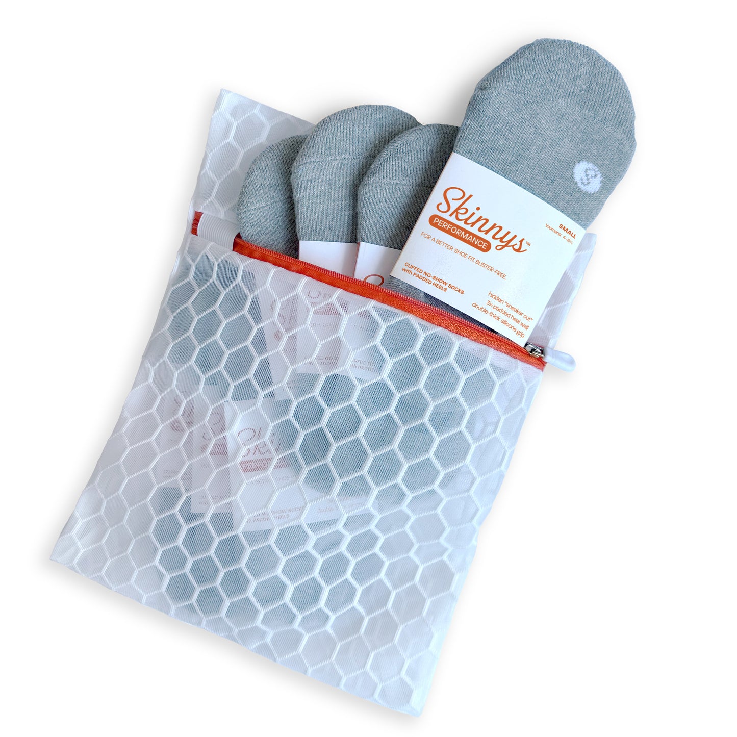 Photo of a Skinnys Performance Daily Pack, with 7 pairs and a mesh wash bag