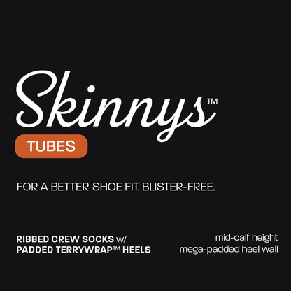 Front panel of Skinnys Tubes packaging: Skinnys Tubes. For a better shoe fit. Blister Free. Ribbed Crew Socks w/ Padded TerryWrap Heels. Mid-calf height. Mega-padded heel wall.