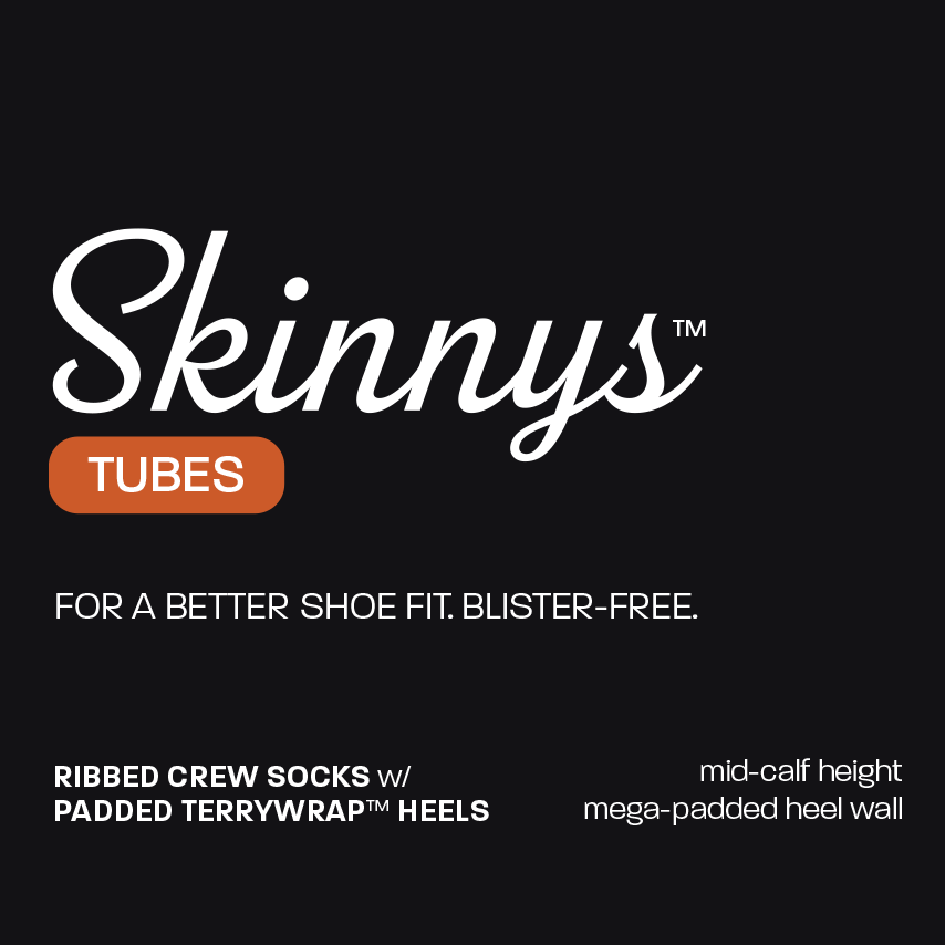 Front panel of Skinnys Tubes packaging: Skinnys Tubes. For a better shoe fit. Blister Free. Ribbed Crew Socks w/ Padded TerryWrap Heels. Mid-calf height. Mega-padded heel wall.